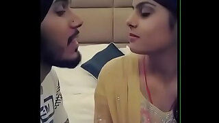 Punjabi boy kissing girlfriend